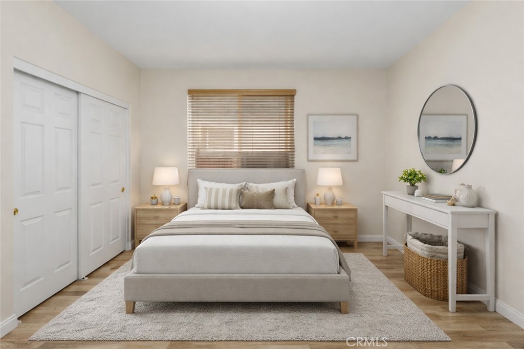 39264 Memory Drive Murrieta, CA 92563 - Photo 18 of 35 a bedroom with a bed a mirror and a window