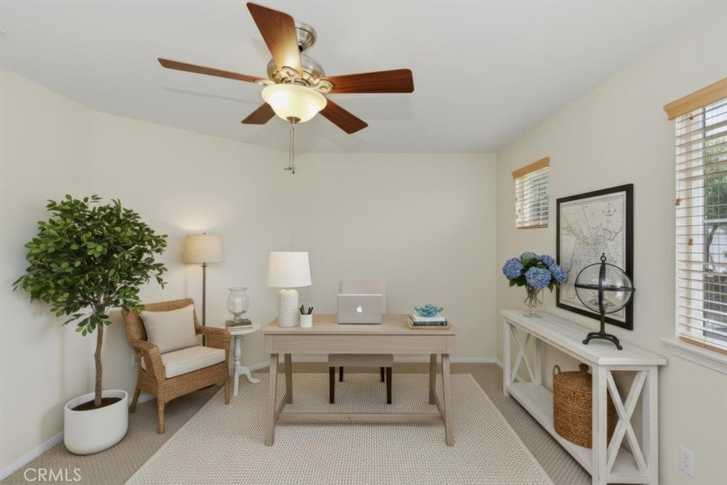 39264 Memory Drive Murrieta, CA 92563 - Photo 21 of 35 a living room with furniture and a potted plant
