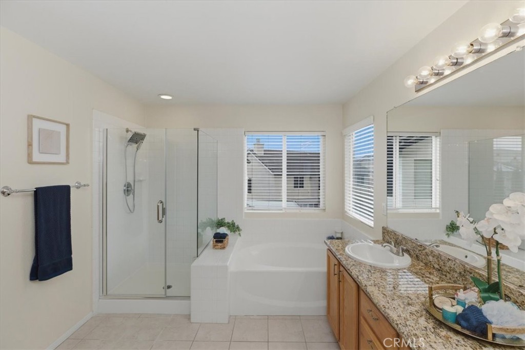 39264 Memory Drive Murrieta, CA 92563 - Photo 27 of 35 a bath tub sitting in a bathroom next to a window