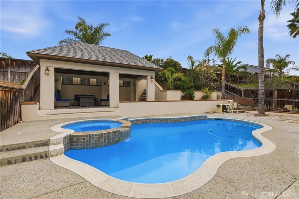 39264 Memory Drive Murrieta, CA 92563 - Photo 31 of 35 a swimming pool with outdoor seating