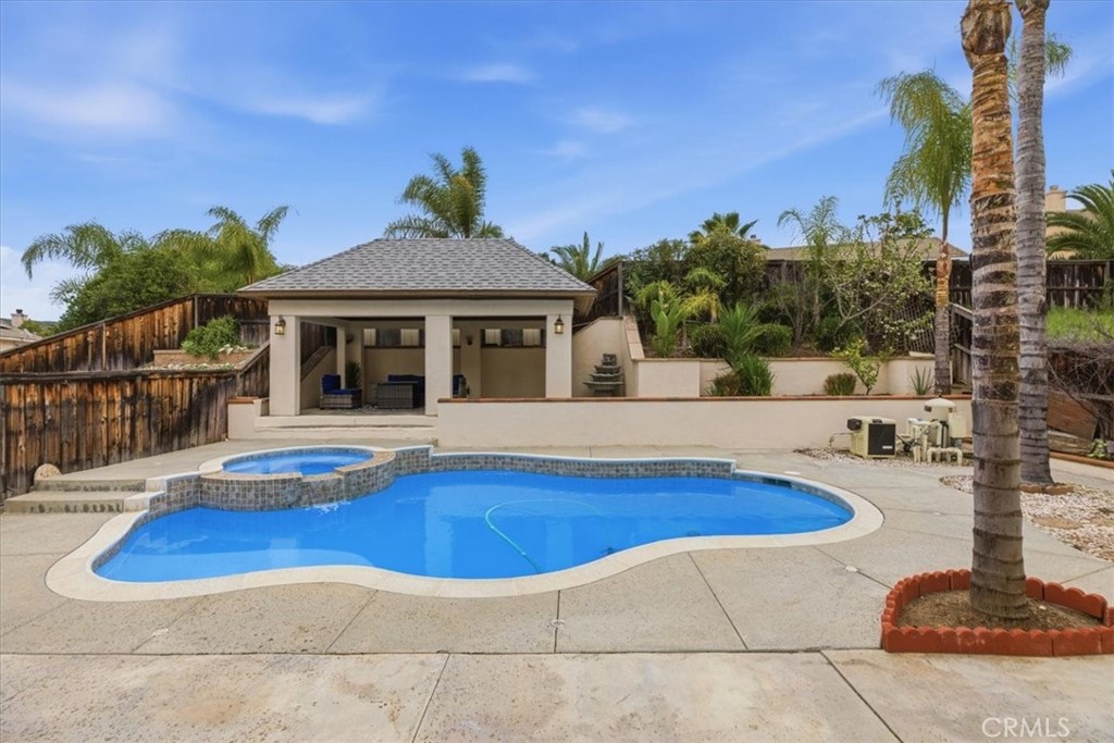 39264 Memory Drive Murrieta, CA 92563 - Photo 32 of 35 a view of house with swimming pool outdoor seating