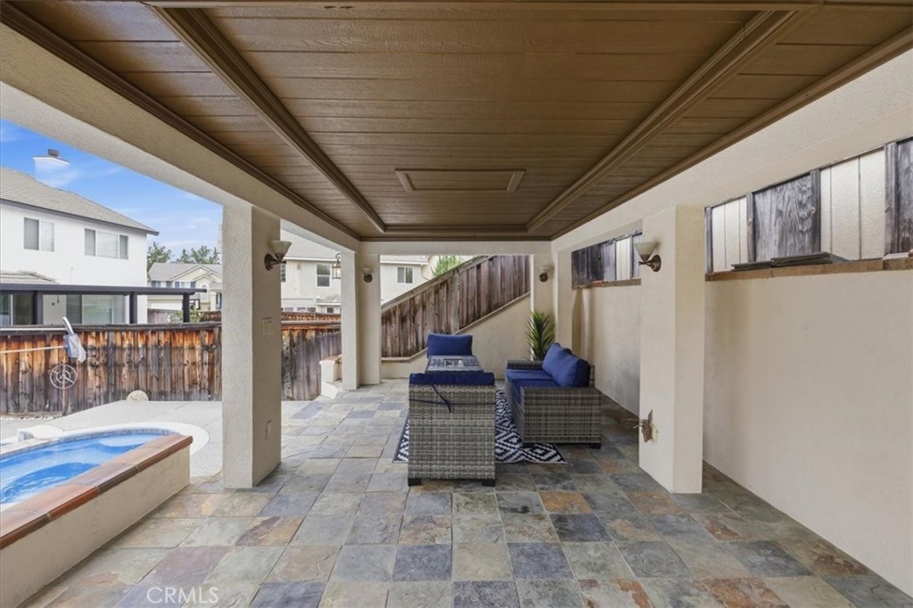 39264 Memory Drive Murrieta, CA 92563 - Photo 34 of 35 a building outdoor space with patio furniture and entryway