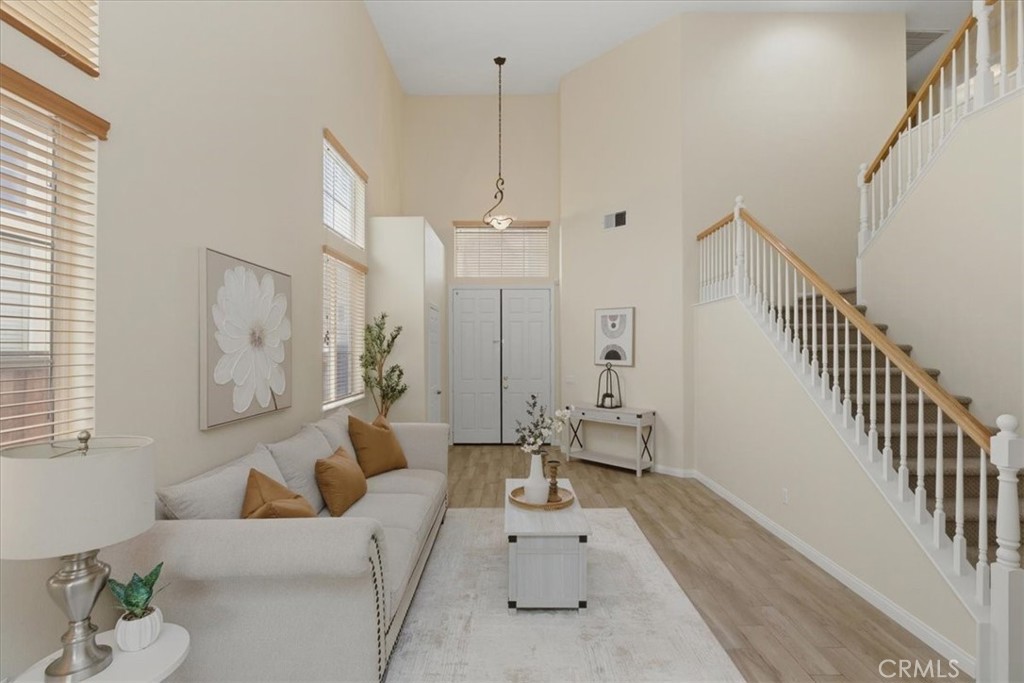 39264 Memory Drive Murrieta, CA 92563 - Photo 4 of 35 a living room with furniture and a chandelier