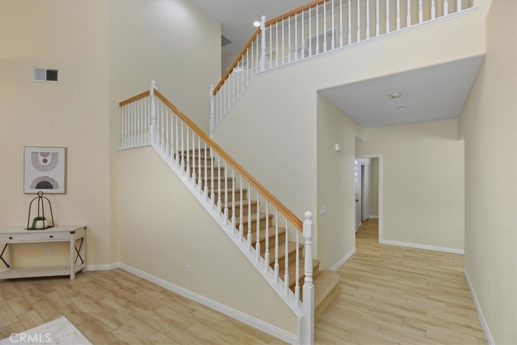 39264 Memory Drive Murrieta, CA 92563 - Photo 7 of 35 a view of an entryway with wooden floor