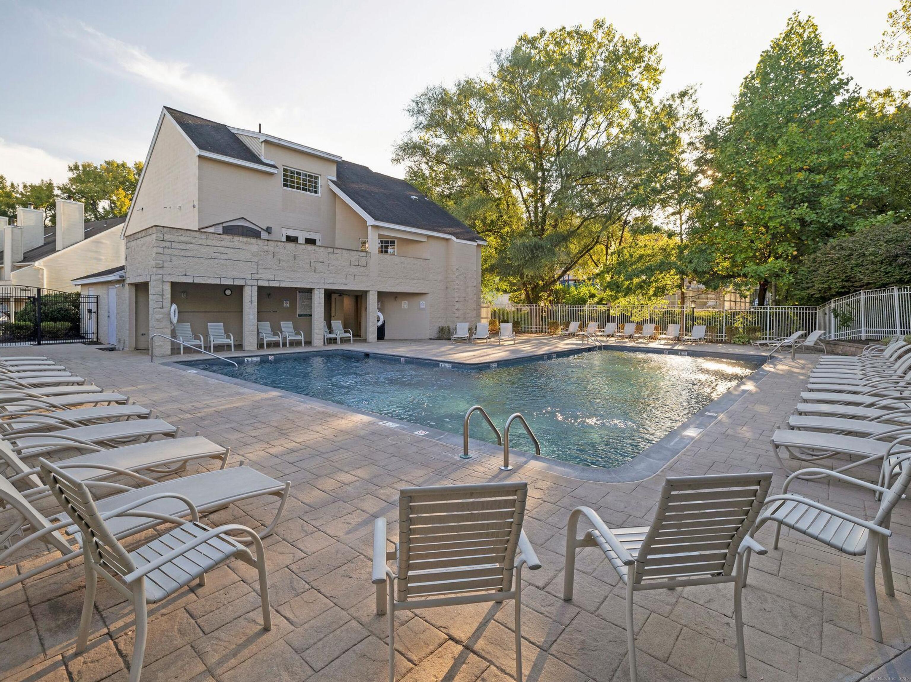 52 Willow Springs, Unit 52 New Milford, CT 06776 - Photo 12 of 14 a view of house with yard and sitting area