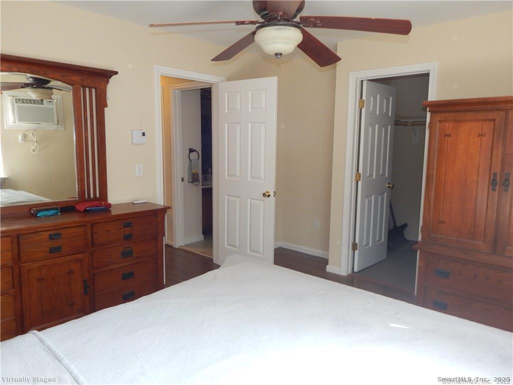 52 Willow Springs, Unit 52 New Milford, CT 06776 - Photo 7 of 14 a bedroom with a bed and a dresser