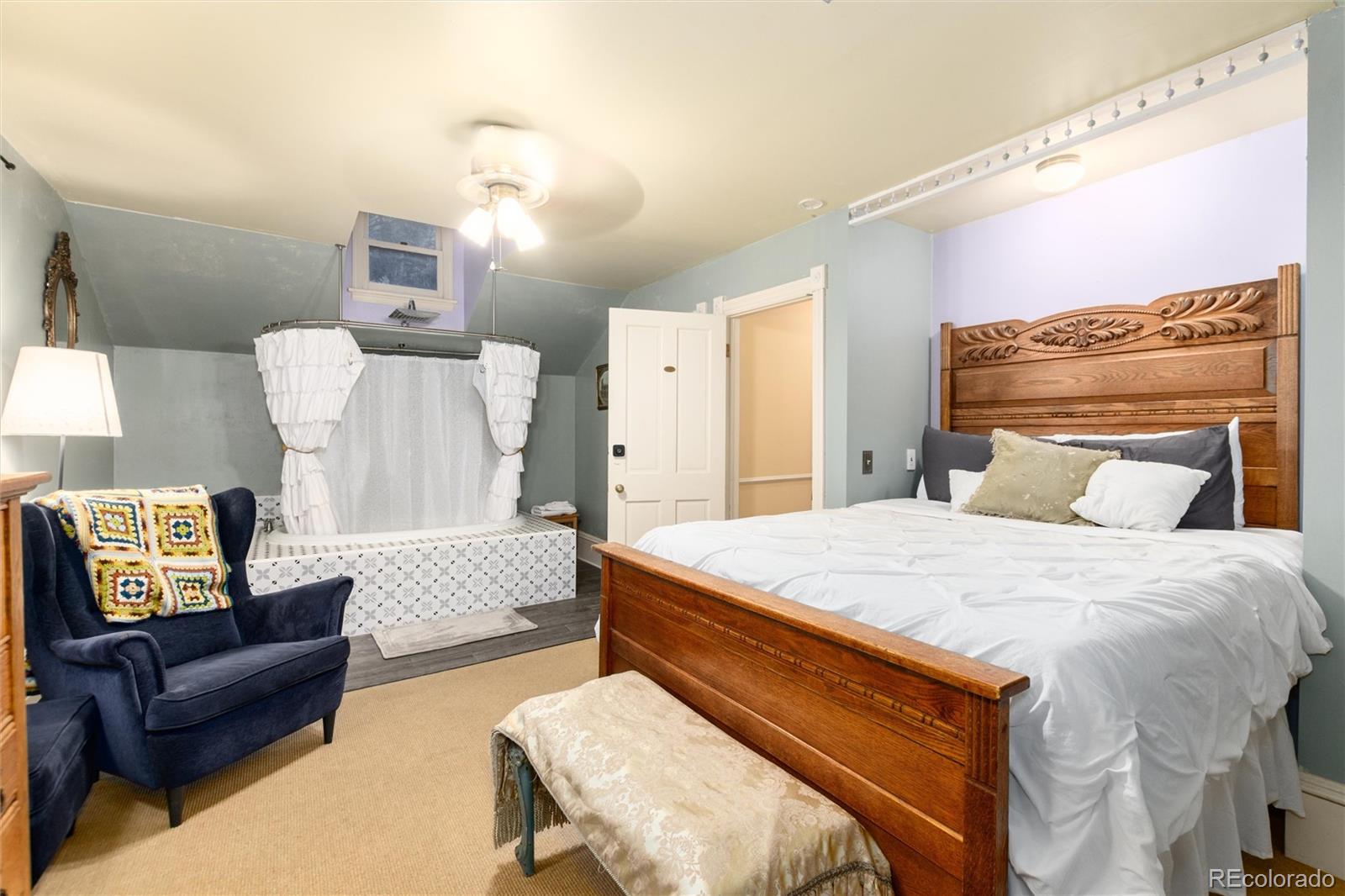 200 Rose Street Georgetown, CO 80444 - Photo 20 of 43 a bedroom with a bed couch and window