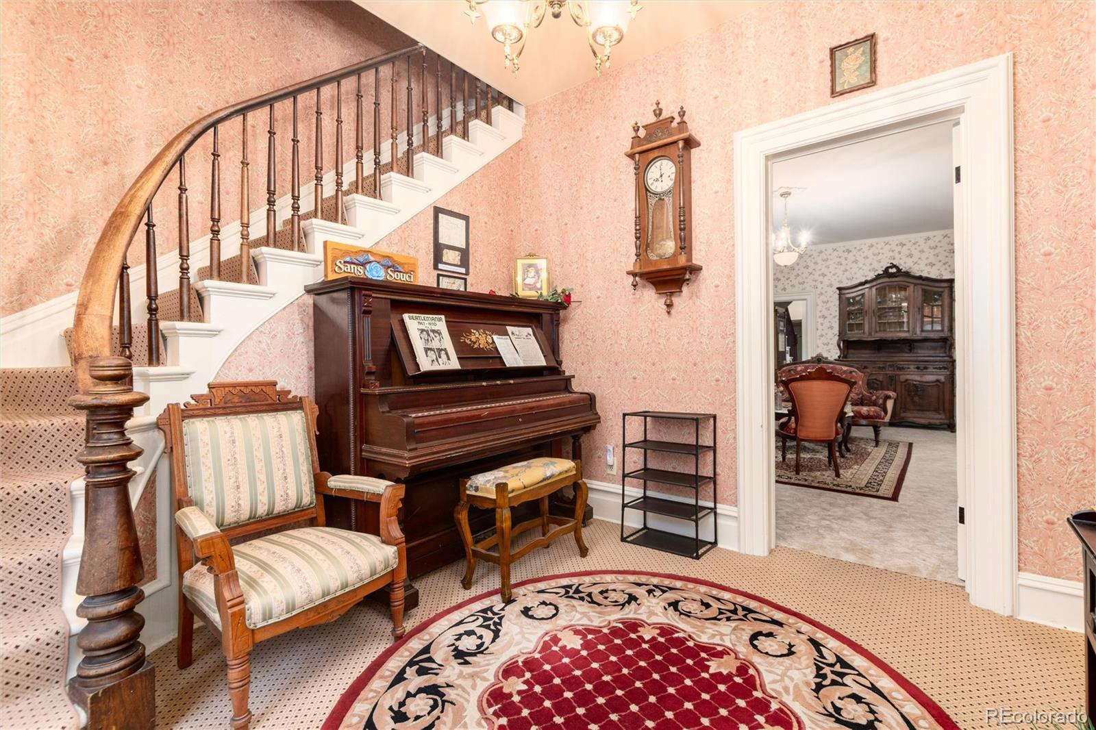 200 Rose Street Georgetown, CO 80444 - Photo 2 of 43 a living room with furniture and a wooden floor