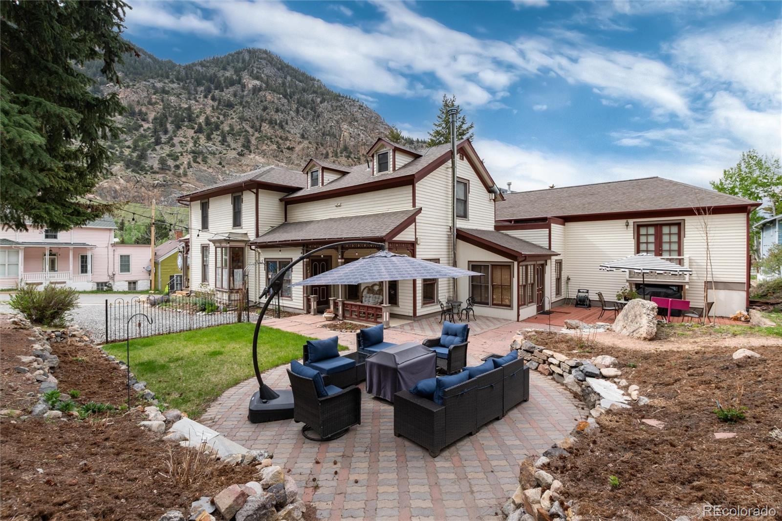 200 Rose Street Georgetown, CO 80444 - Photo 36 of 43 a view of a house with backyard and sitting area