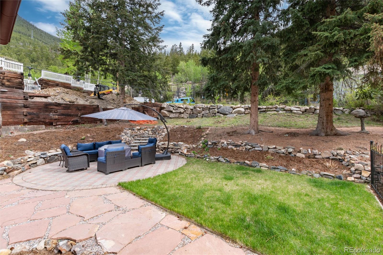 200 Rose Street Georgetown, CO 80444 - Photo 39 of 43 a view of a backyard with sitting area