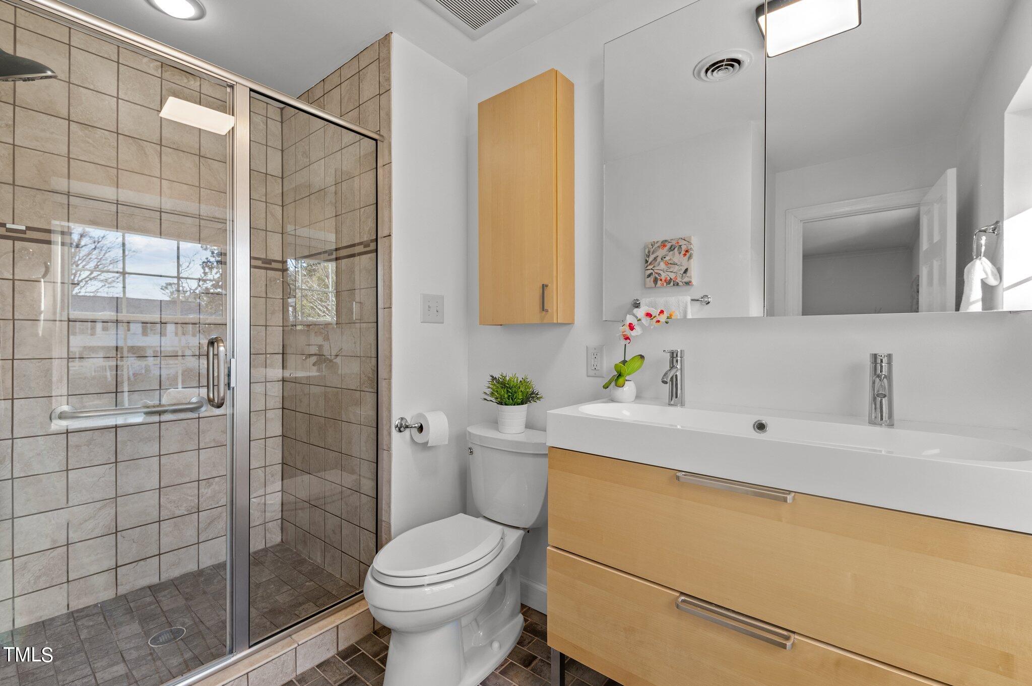 4712 Scollay Court Raleigh, NC 27609 - Photo 21 of 32 Updated Full Bathroom