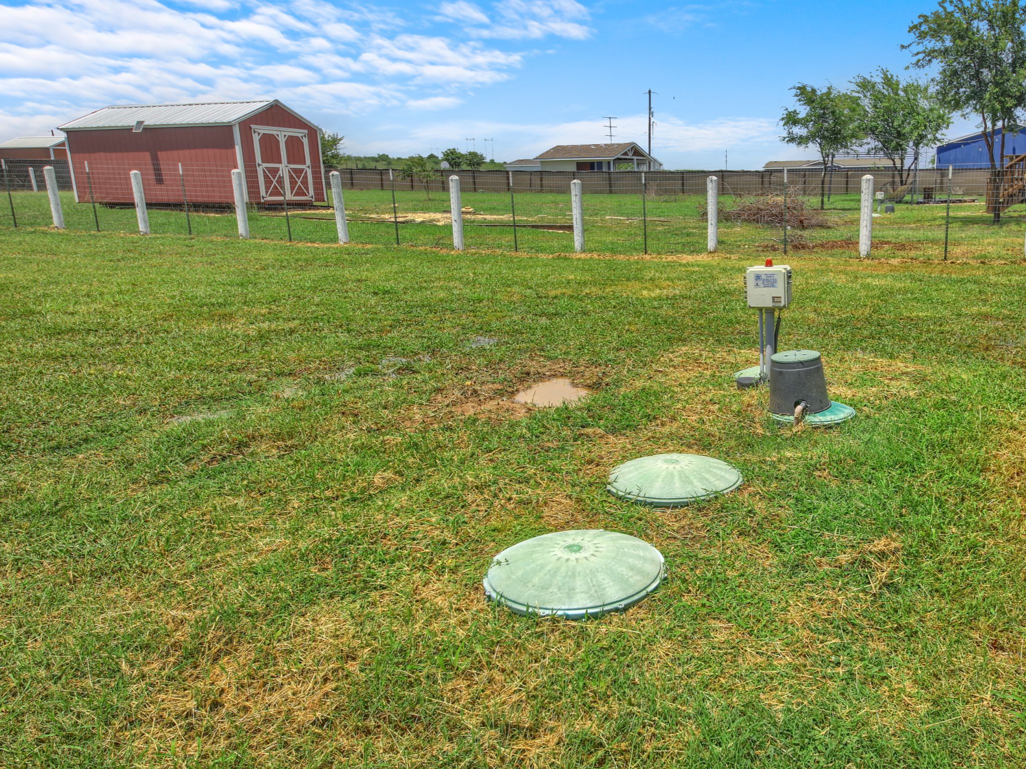 271 Alma Lane Kyle, TX 78640 - Photo 19 of 25 a view of a house with a backyard