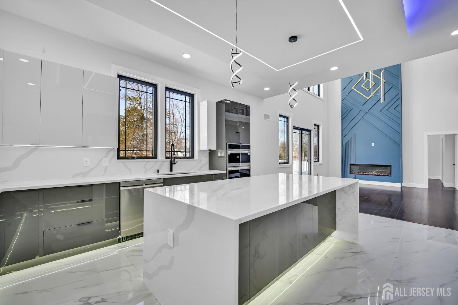 11 Williams Road Kendall Park, NJ 08824 - Photo 14 of 60 a large white kitchen with a large window