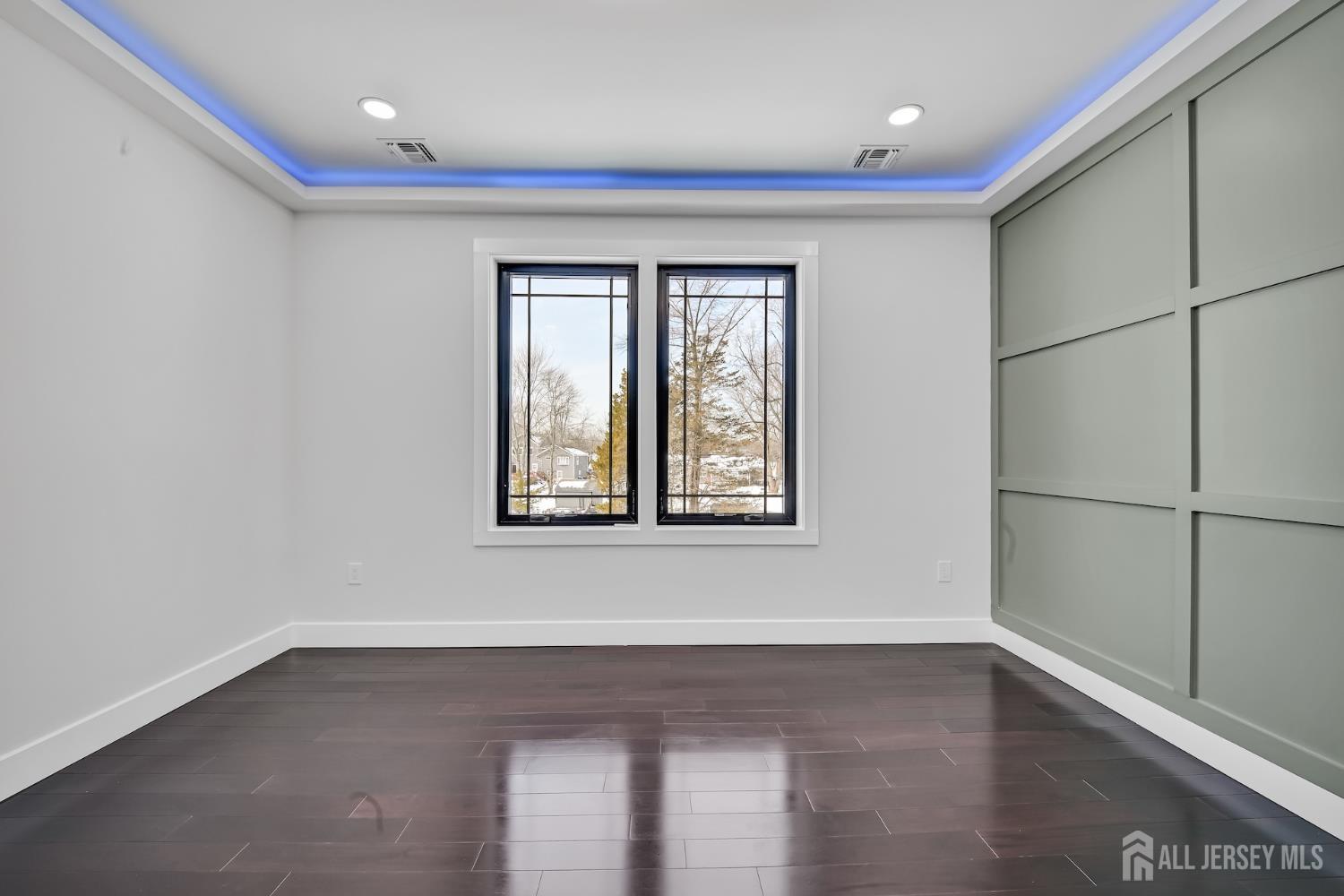 11 Williams Road Kendall Park, NJ 08824 - Photo 31 of 60 an empty room with wooden floor and windows