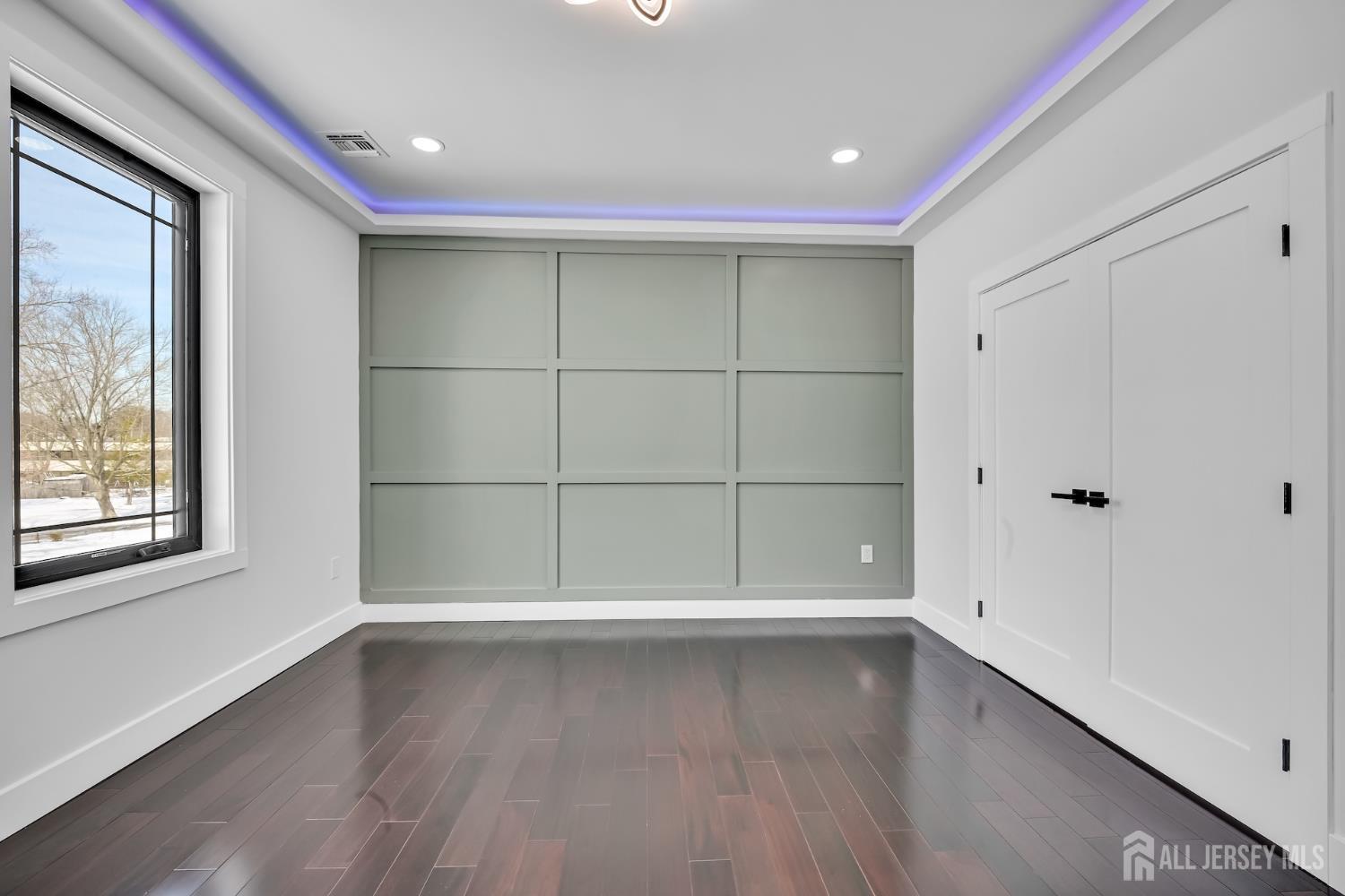 11 Williams Road Kendall Park, NJ 08824 - Photo 32 of 60 an empty room with wooden floor and windows