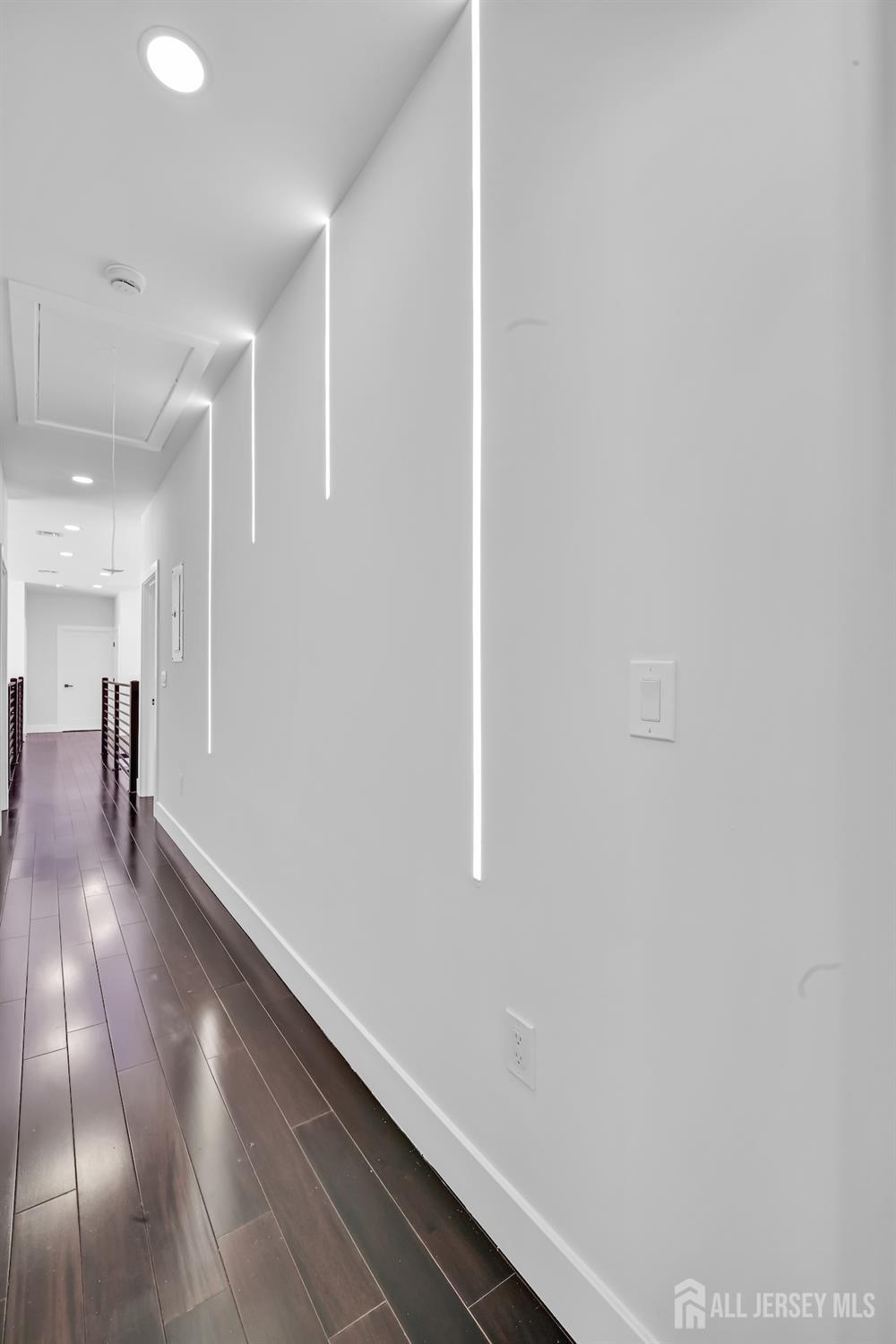 11 Williams Road Kendall Park, NJ 08824 - Photo 35 of 60 a view of a hallway with wooden floor