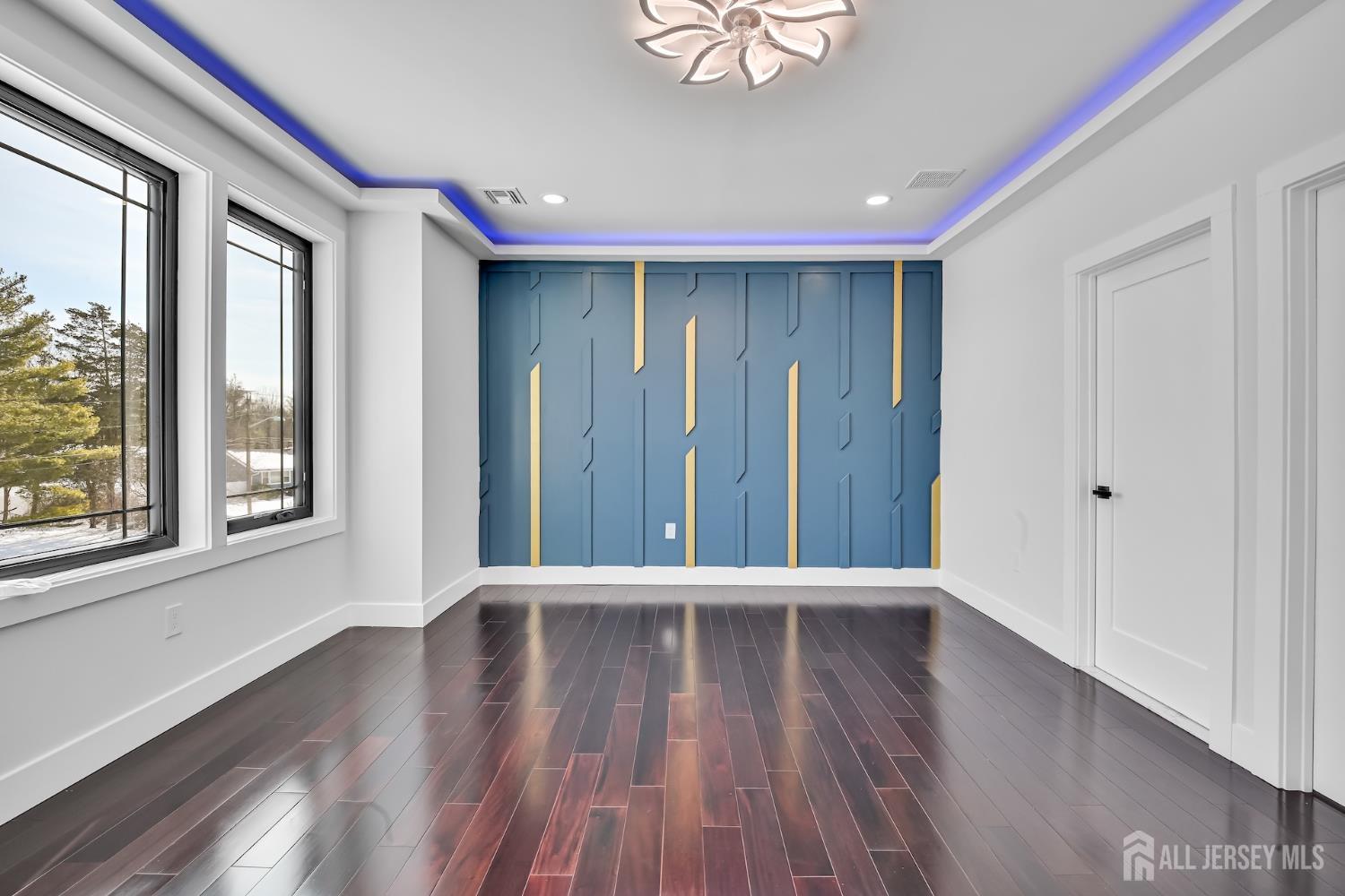 11 Williams Road Kendall Park, NJ 08824 - Photo 36 of 60 a view of a hallway with wooden floor and a window