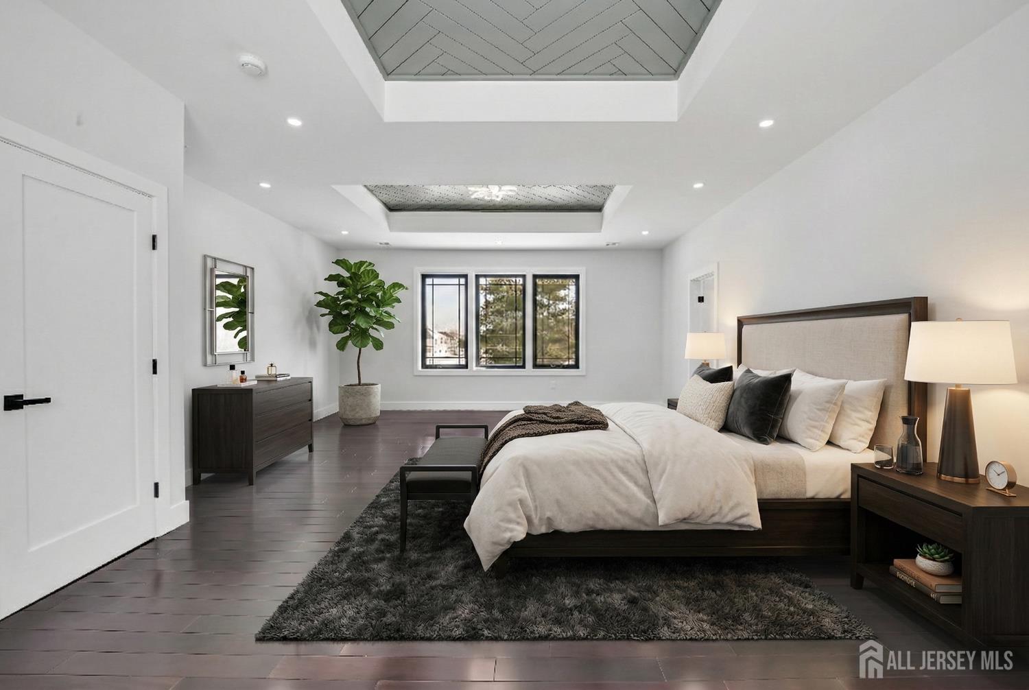 11 Williams Road Kendall Park, NJ 08824 - Photo 43 of 60 a bedroom with a large bed and a couch