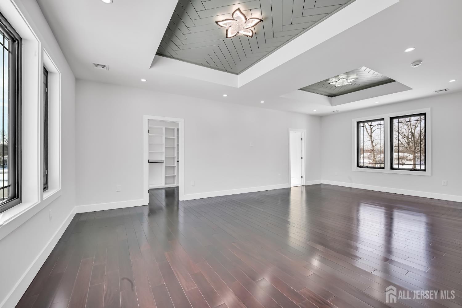 11 Williams Road Kendall Park, NJ 08824 - Photo 44 of 60 an empty room with wooden floor and windows