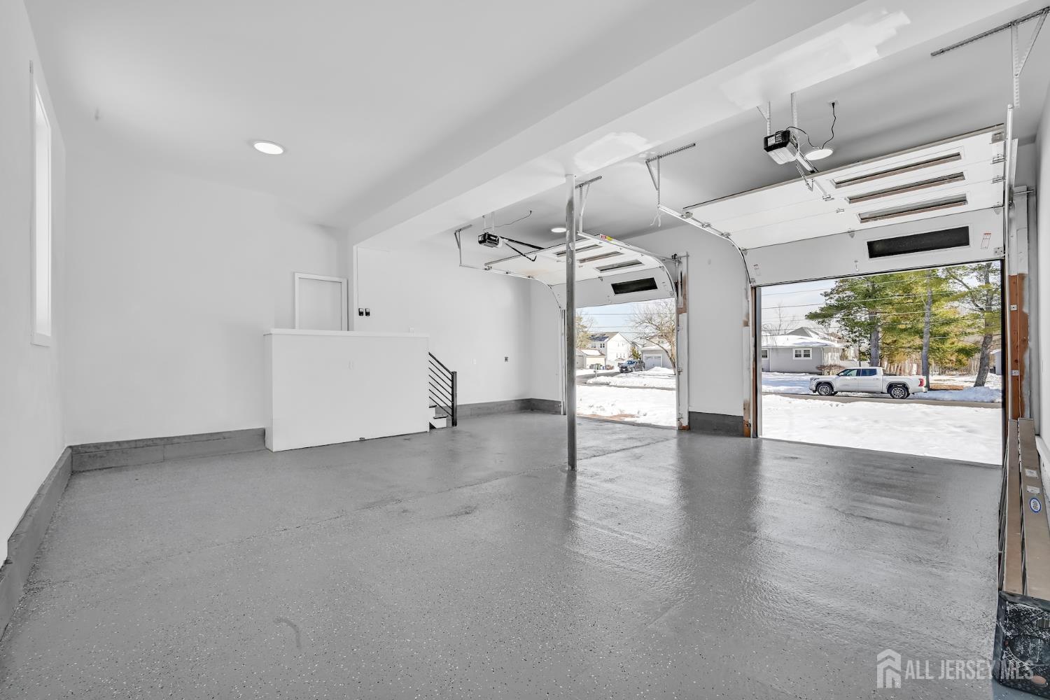11 Williams Road Kendall Park, NJ 08824 - Photo 55 of 60 an empty room with wooden floor and windows
