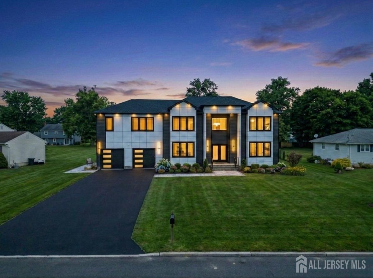 11 Williams Road Kendall Park, NJ 08824 - Photo 59 of 60 a front view of a house with garden