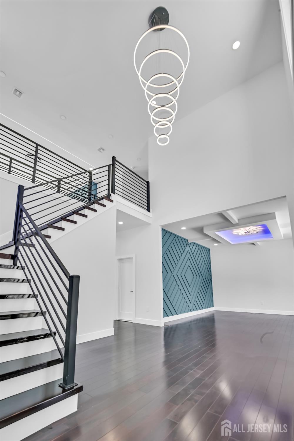 11 Williams Road Kendall Park, NJ 08824 - Photo 7 of 60 a view of entryway and hall with wooden floor