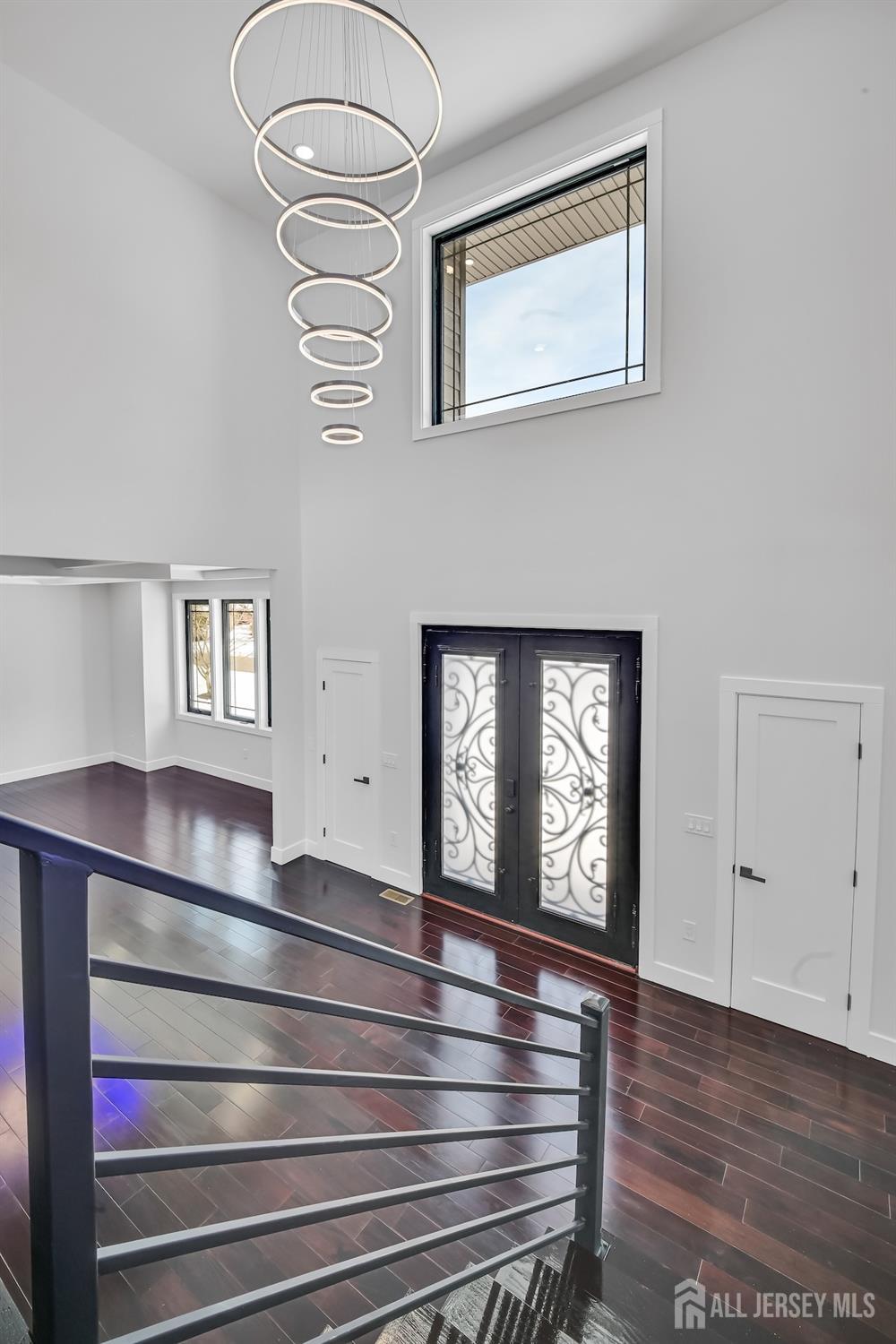 11 Williams Road Kendall Park, NJ 08824 - Photo 9 of 60 a view of an entryway with wooden floor