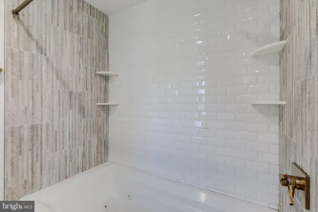 a bathroom with a bathtub