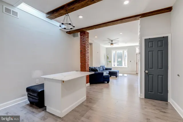 a view of a livingroom with furniture and furniture