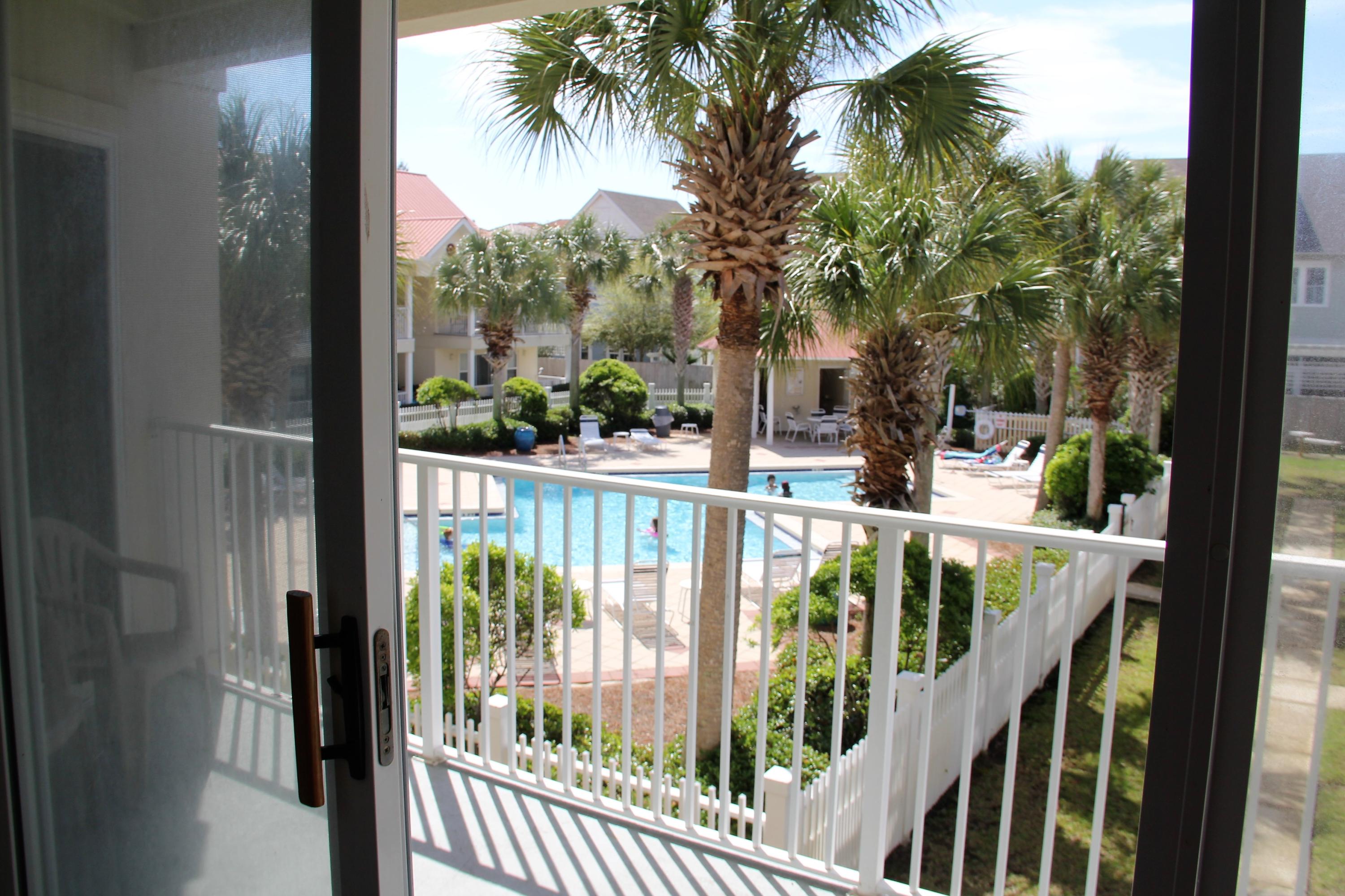 82 Sugar Sand Lane, Unit B4 Santa Rosa Beach, FL 32459 - Photo 11 of 33 a view of a balcony with wooden floor