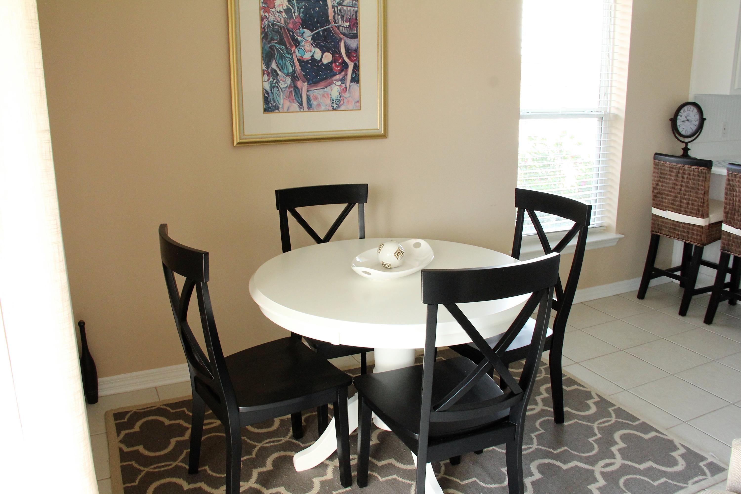 82 Sugar Sand Lane, Unit B4 Santa Rosa Beach, FL 32459 - Photo 15 of 33 a view of a dining room with furniture and a table