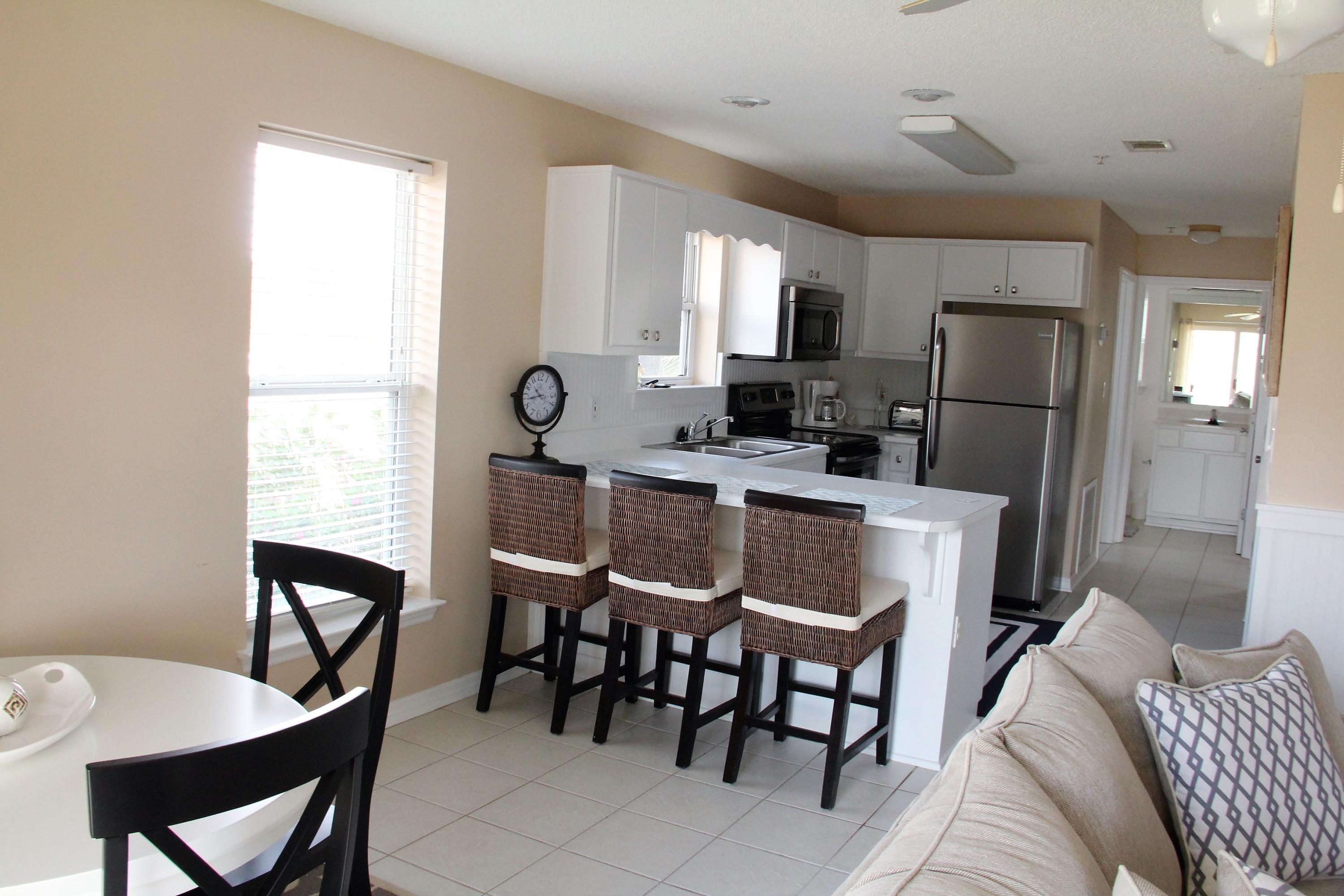 82 Sugar Sand Lane, Unit B4 Santa Rosa Beach, FL 32459 - Photo 20 of 33 a view of a dining room with furniture