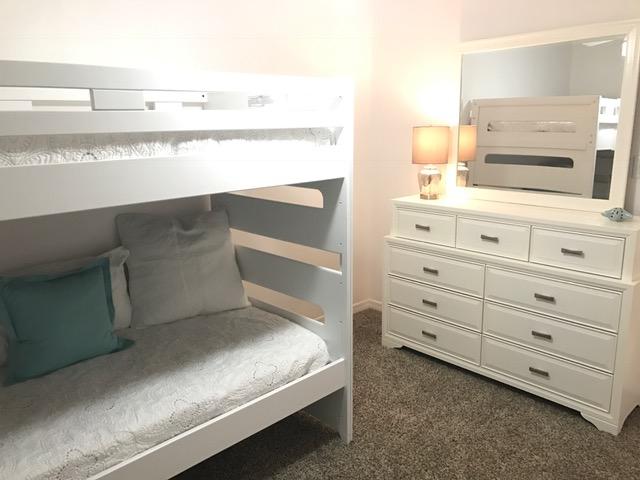 82 Sugar Sand Lane, Unit B4 Santa Rosa Beach, FL 32459 - Photo 24 of 33 a living room with furniture and flat screen tv
