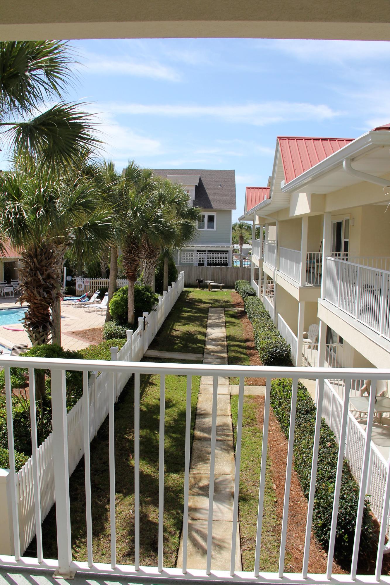 82 Sugar Sand Lane, Unit B4 Santa Rosa Beach, FL 32459 - Photo 29 of 33 a view of a balcony with chairs