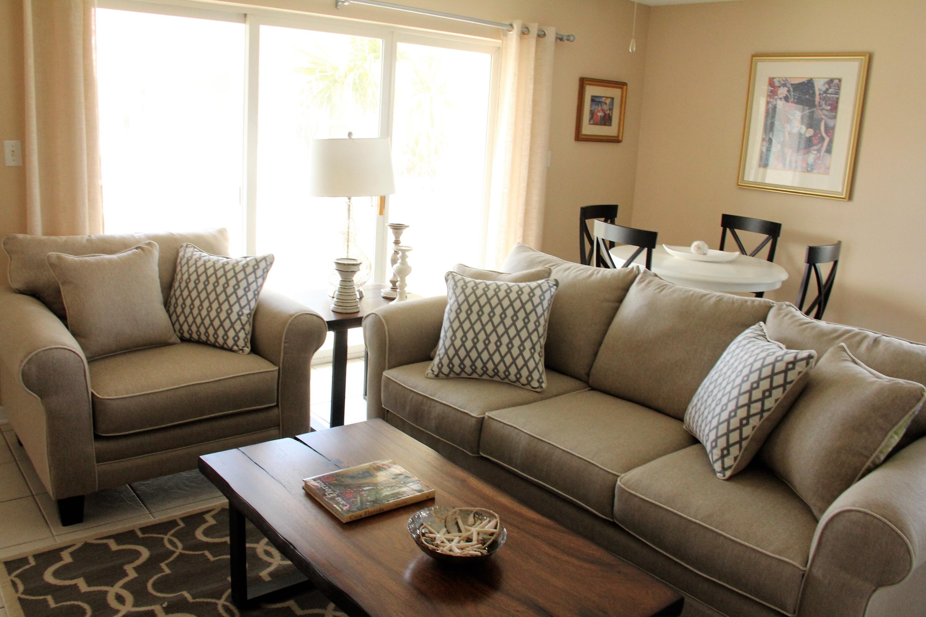82 Sugar Sand Lane, Unit B4 Santa Rosa Beach, FL 32459 - Photo 4 of 33 a living room with furniture and a window