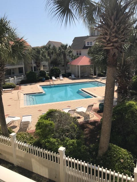 82 Sugar Sand Lane, Unit B4 Santa Rosa Beach, FL 32459 - Photo 31 of 33 a view of a swimming pool with a patio and a yard