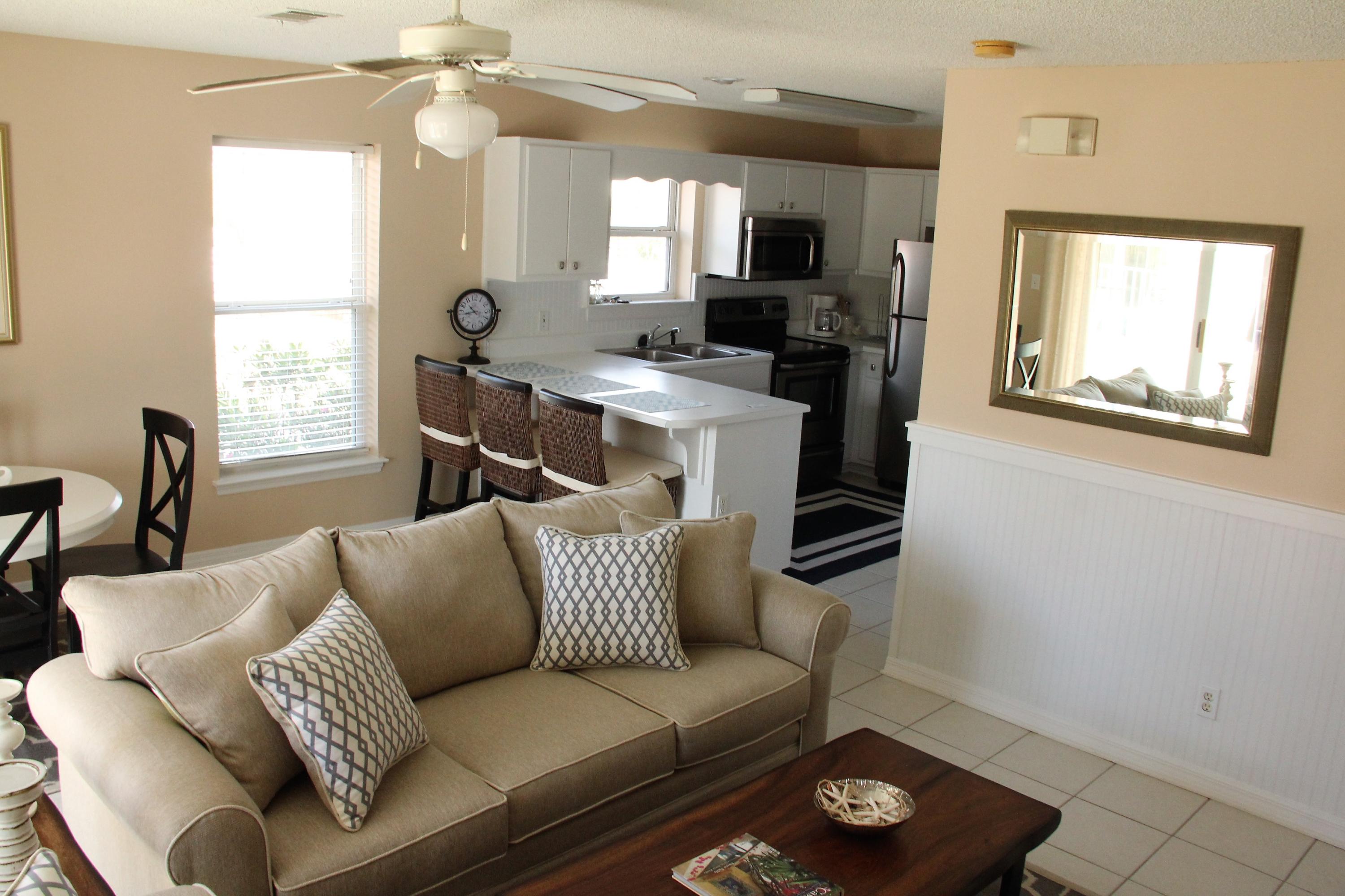 82 Sugar Sand Lane, Unit B4 Santa Rosa Beach, FL 32459 - Photo 6 of 33 a living room with furniture and a window