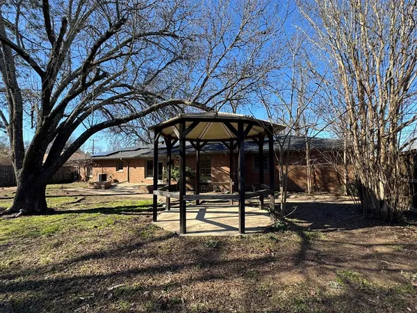 a view of house with a outdoor space