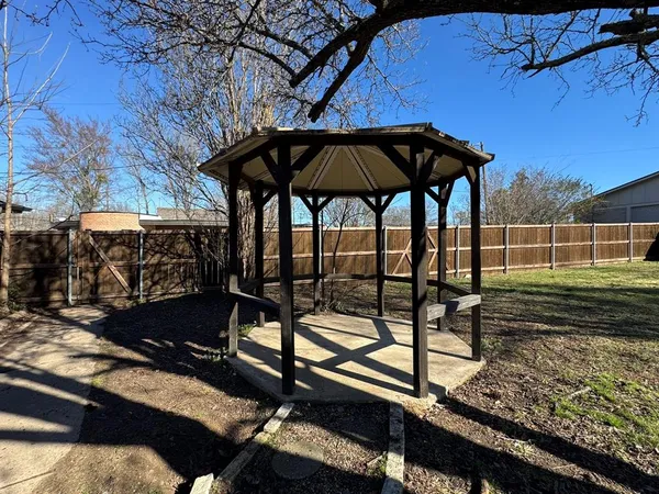 a view of yard with wooden deck