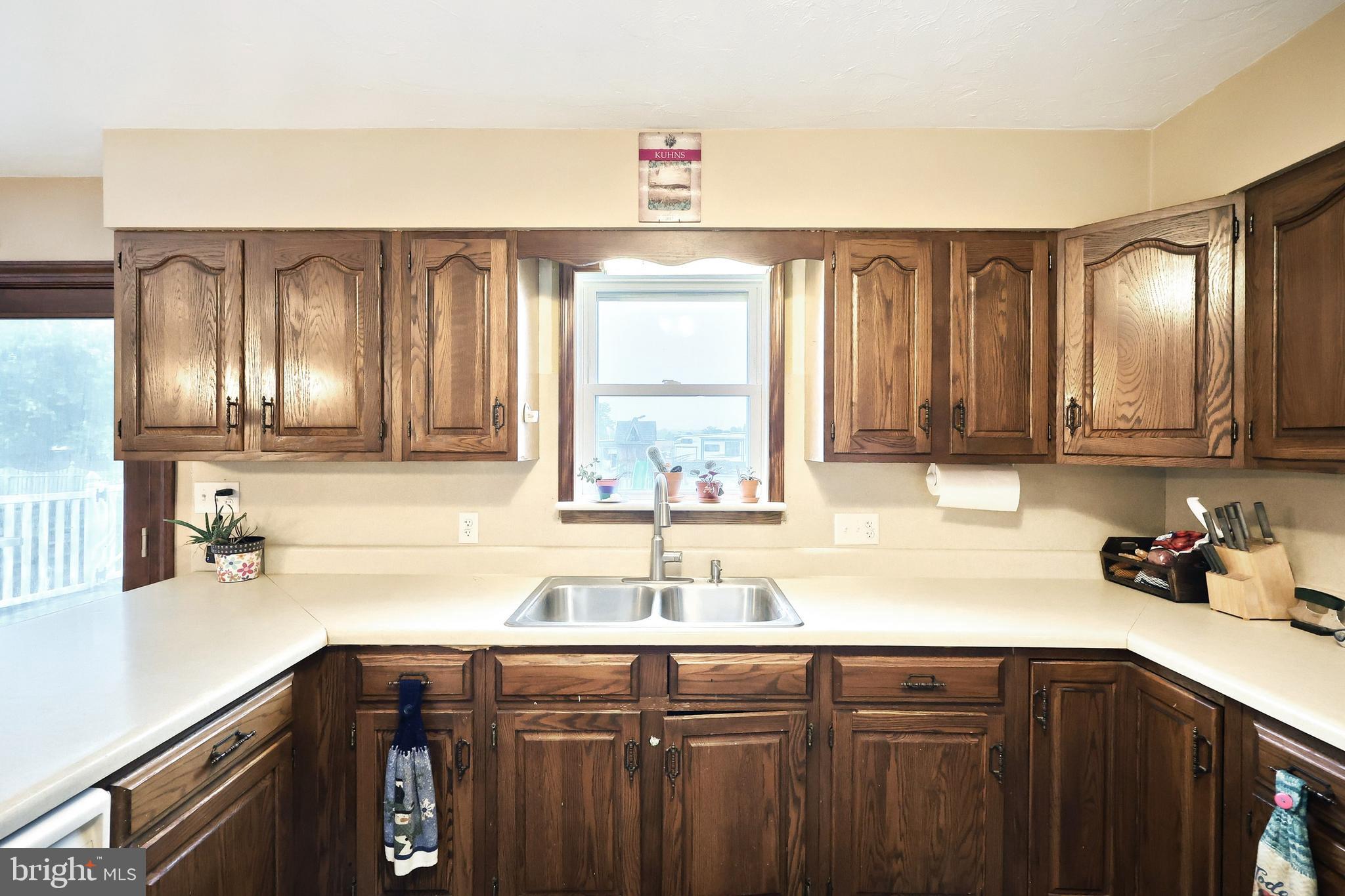 2856 Centennial Road Hanover, PA 17331 - Photo 11 of 34 a kitchen with a sink cabinets and window