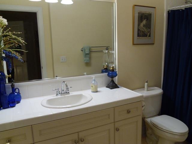 7465 South Harpeth Road Franklin, TN 37064 - Photo 11 of 30 a bathroom with a sink and a toilet
