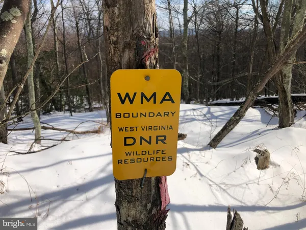 a sign on the side of the road