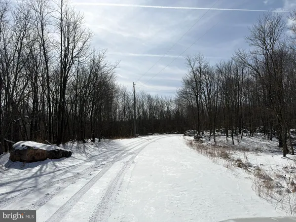 a sign on the side of a road