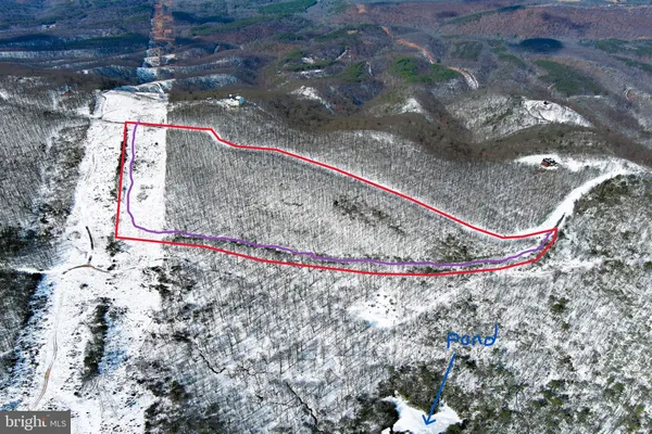 a view of a beach with a ocean view