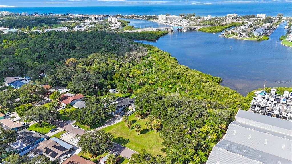 145th Lane Largo, FL 33774 - Photo 17 of 29 a view of a lake with a building in the background