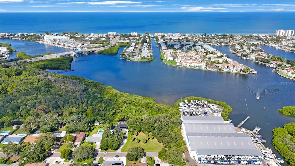 145th Lane Largo, FL 33774 - Photo 19 of 29 a view of a lake with a building in the background