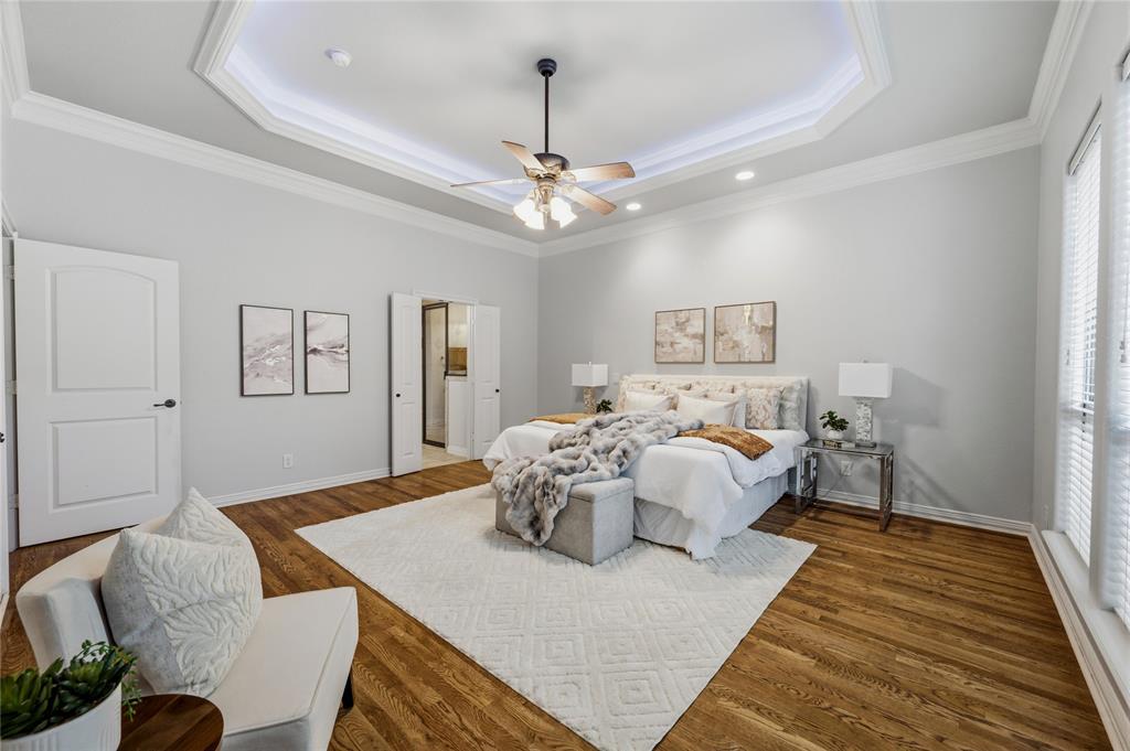 620 Highview Lane Hurst, TX 76054 - Photo 20 of 40 Tray ceiling with crown molding and recessed lighting