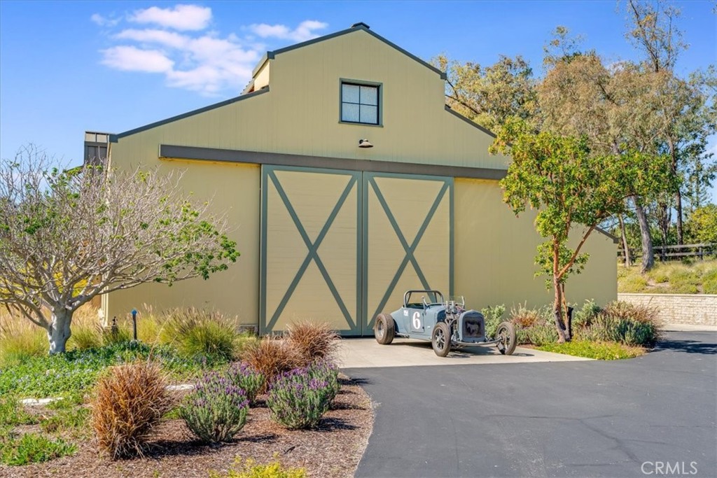 1604 Tiffany Ranch Road Arroyo Grande, CA 93420 - Photo 16 of 32 a front view of a house with garden