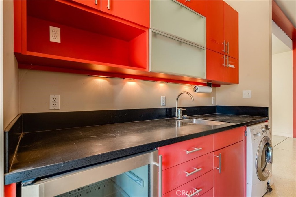 1604 Tiffany Ranch Road Arroyo Grande, CA 93420 - Photo 18 of 32 a kitchen with a sink and a cabinets