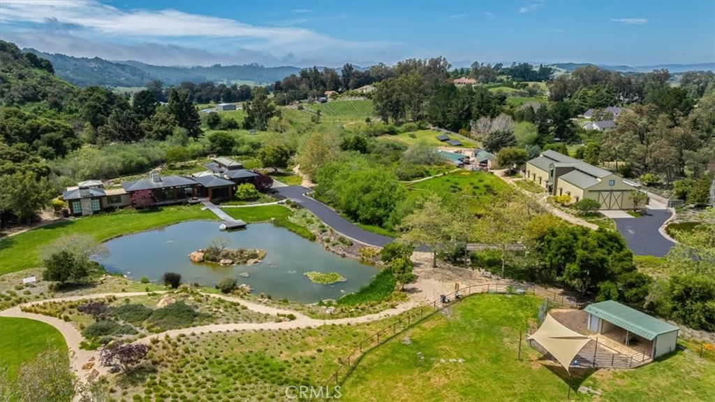 1604 Tiffany Ranch Road Arroyo Grande, CA 93420 - Photo 27 of 32 an aerial view of a house with a yard